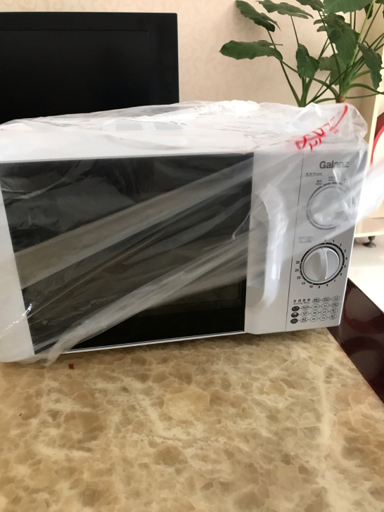 全新格兰仕光波炉，单位发的，家里有，出售
