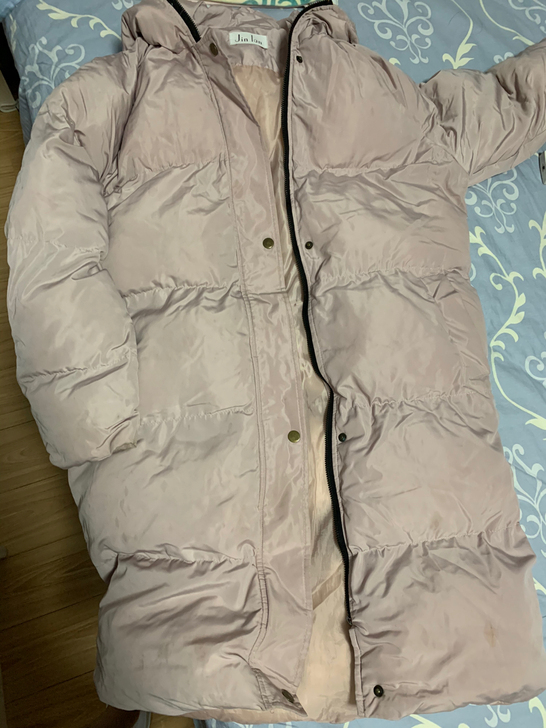 纯粉色棉服 有些洗不掉的墨水