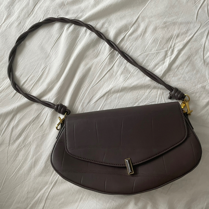 真皮女包 腋下包 手提包 扣子轻微掉色 补...