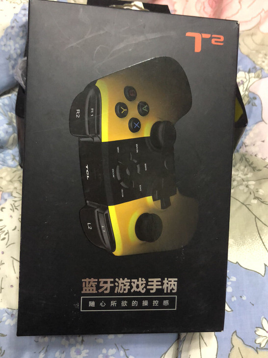 TCL游戏蓝牙无线手柄 方向盘特点：无震动...