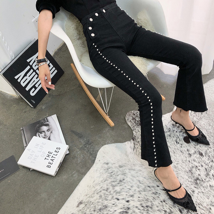 孙瑜儿重工铆钉修身牛仔裤九分微喇叭裤子