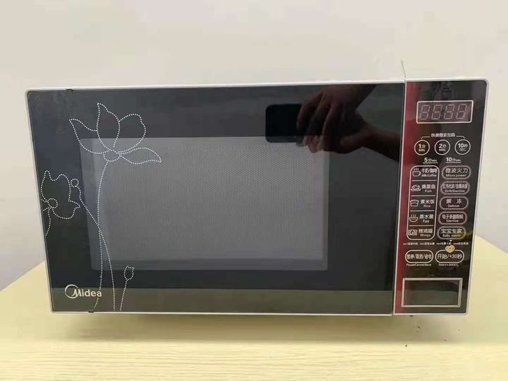 特价转让一台美的微波炉,九成新,新的.69...