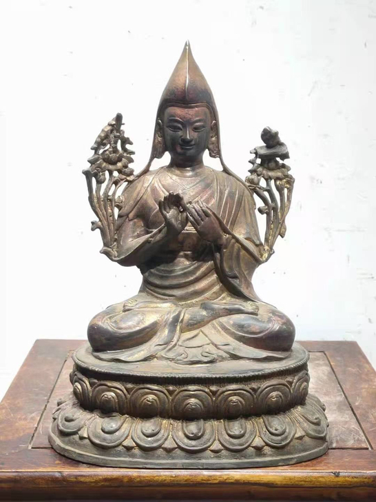 铜佛一尊  包浆厚重  高21.5厘米
