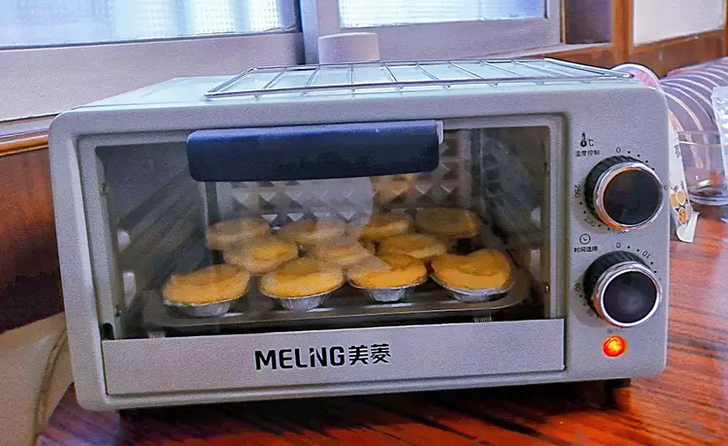 美菱烤箱家用烘焙多功能全自动小型电烤箱台式...