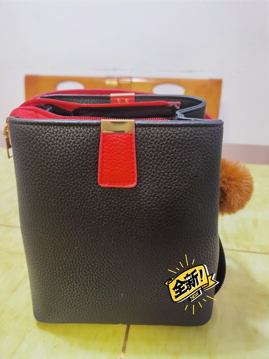 闲置女士手提包一个时尚休闲潮流合适的朋友带...