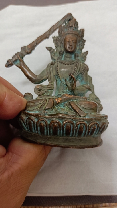 小铜佛像:看好不退，议价不回。