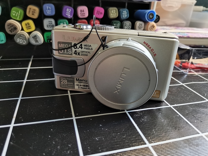 松下LX1老牌子了，但拍照清晰，可录视频，...