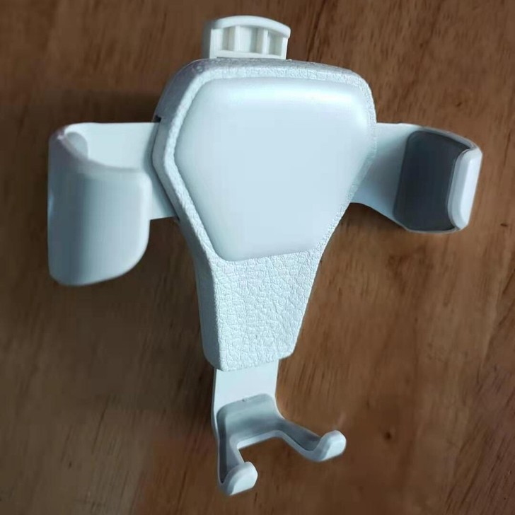 全新出风口车载手机支架重力感应的，放上手机...