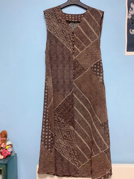 酷酷的一条背心连衣裙 琥珀纽扣 胸以下是开...