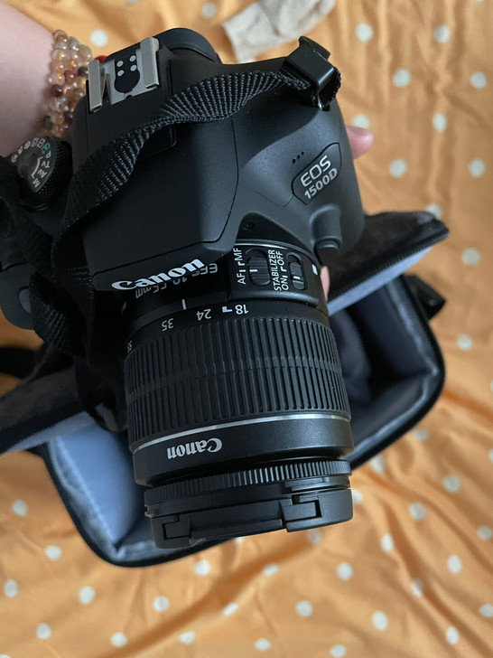 佳能1500d单反相机  架子 书 内存卡...