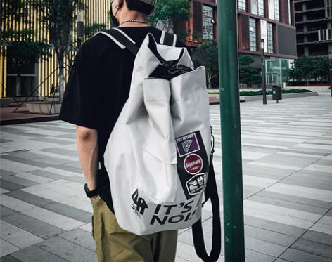 潮牌ins背包男双肩包书包女韩版高中高街风...