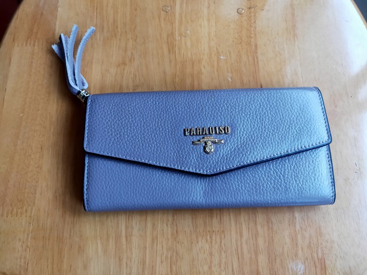 品牌女钱包，老公国外买来的，全新的，  材...