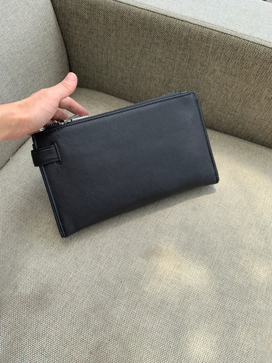 【品牌特价】真皮多拉链手包男黑色头层牛皮大...