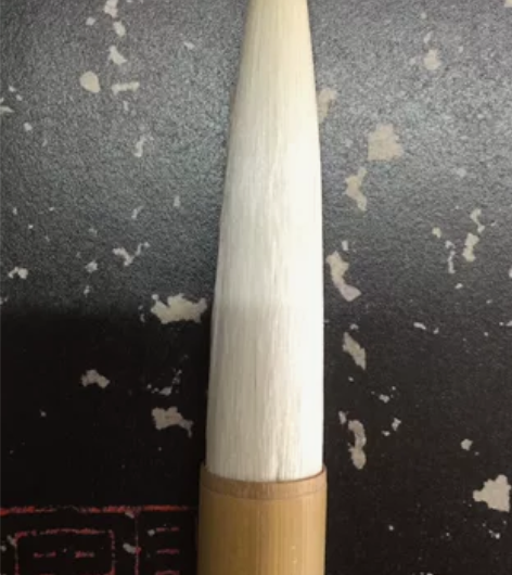 神龙牌8十年代纯羊毫毛笔。此笔笔锋黑子非常...