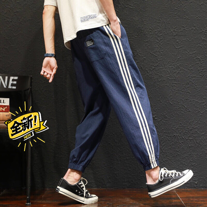 夏季休闲裤男棉麻束脚裤韩版潮流宽松卫裤条纹...