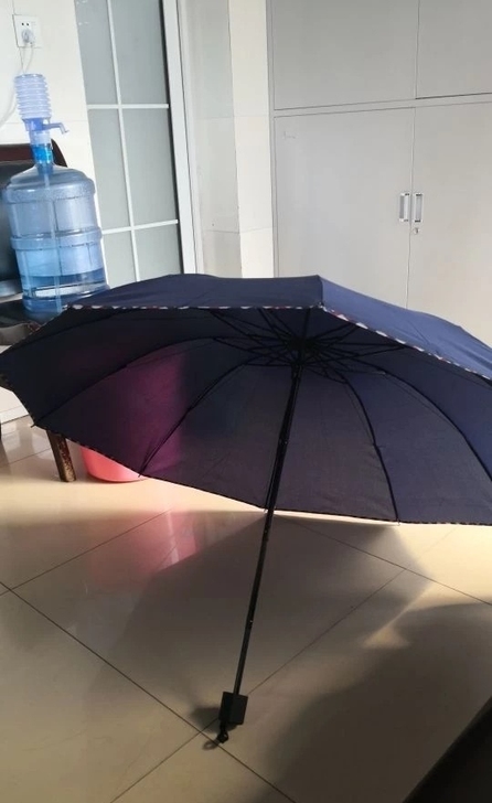 低价出售家里闲置的全手动晴雨两用雨伞