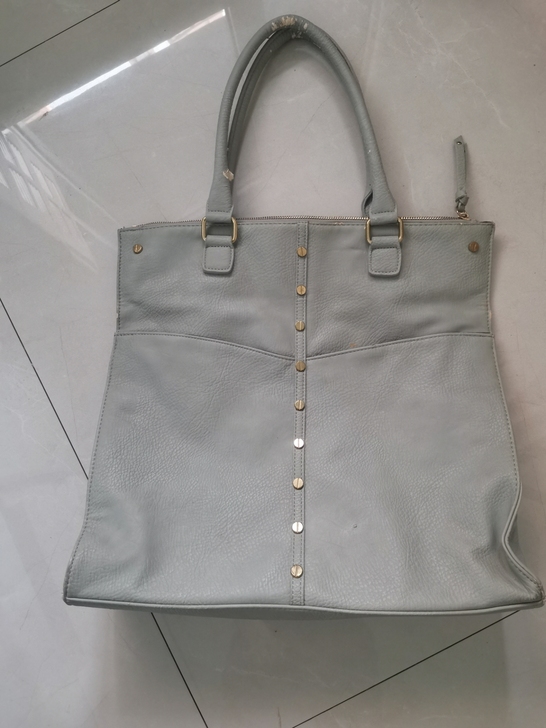 以前从米国带回来的包，真皮的。内里干净几乎...