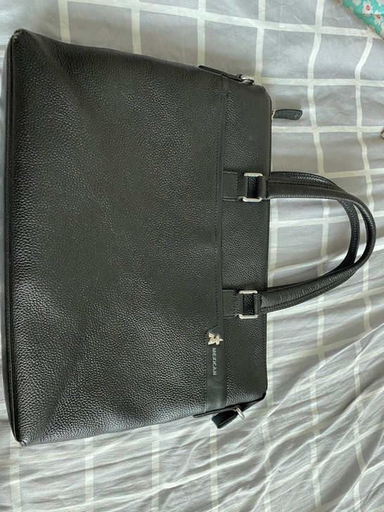 稻草忍商务手提包