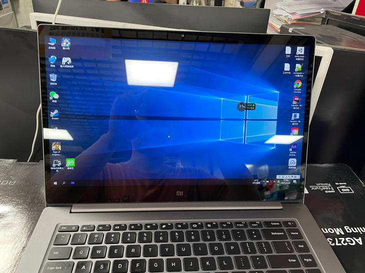 小米笔记本。i7-8550U，8+256G...