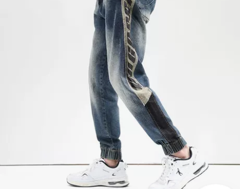 牛仔裤 牛仔长裤潮牌男士宽松大码秋季印花束...