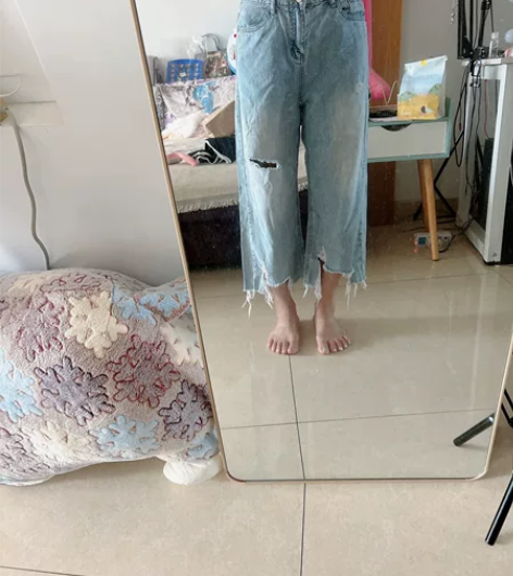 欧货不规则破洞流苏设计师款牛仔裤女2022...