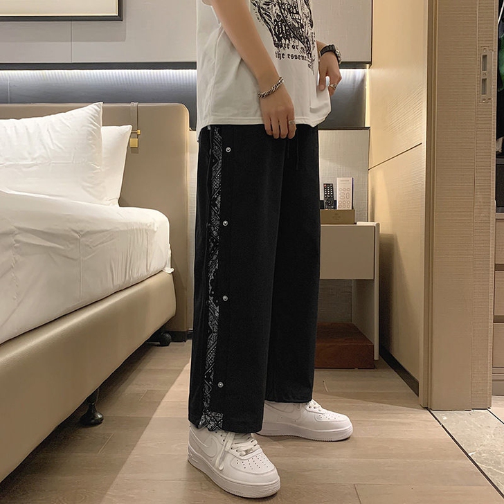 原宿港风休闲裤男潮牌痞帅宽松直筒裤薄款排扣...