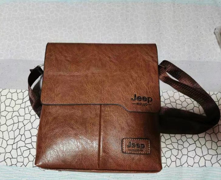 好友送的全新男士单肩斜挎包包，闲置没有用到...