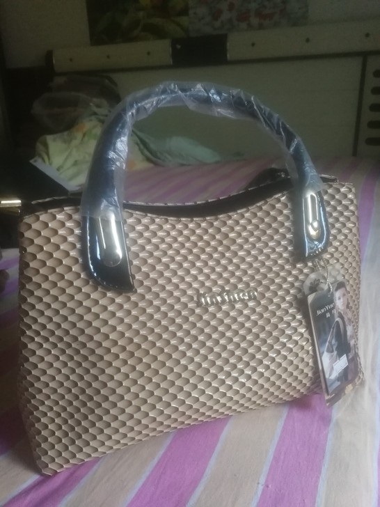 品牌（简约）材质高档PU全新棕色蟒蛇纹女手...