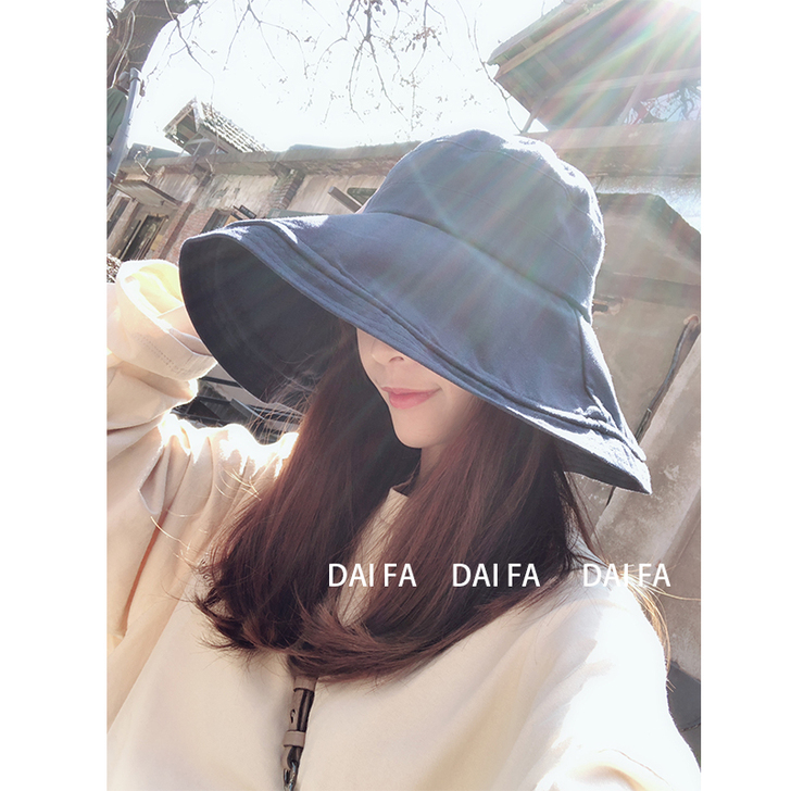 戴发 帽子超级遮阳。夏日必备神器