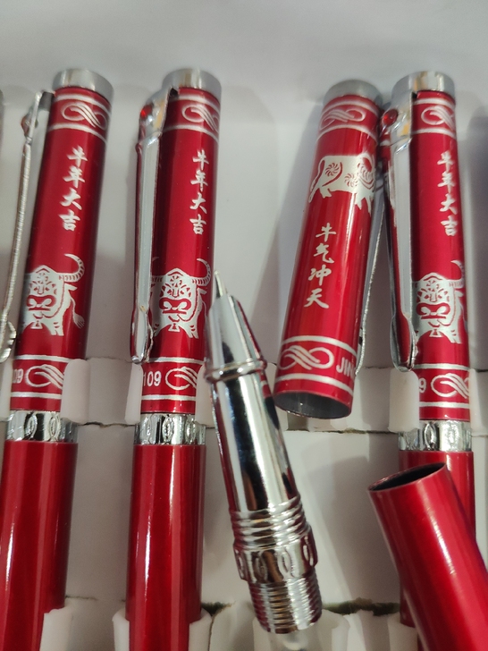牛年大吉 牛气冲天 牛年有礼买笔就赠 钢...