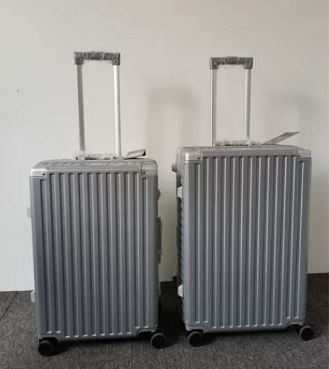 日本漫游PC铝框行李箱万向轮拉杆箱28寸旅...