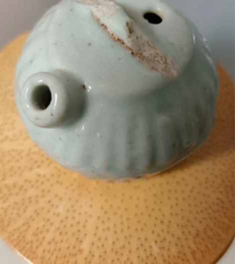 明代乳白釉水滴  釉色肥润  把柄缺磕 其...