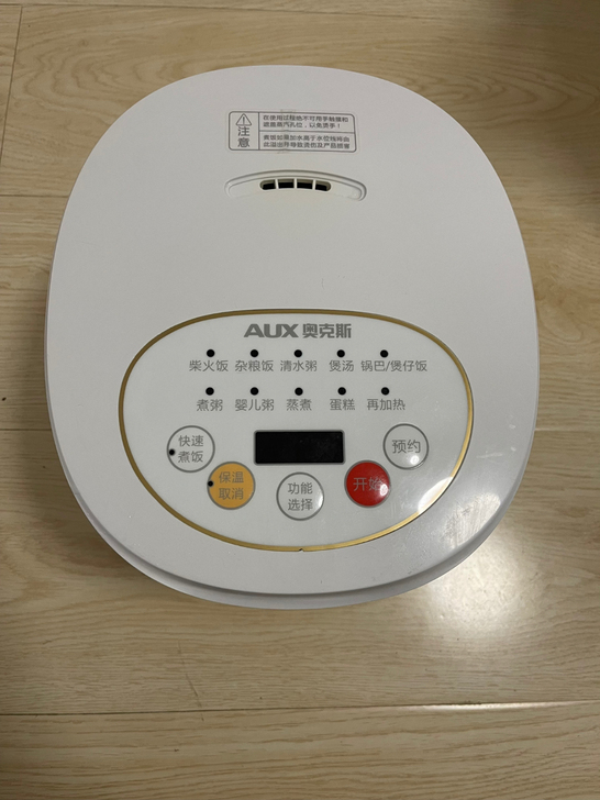 奥克斯电饭煲，买来半年，内胆有划痕，米饭铲...