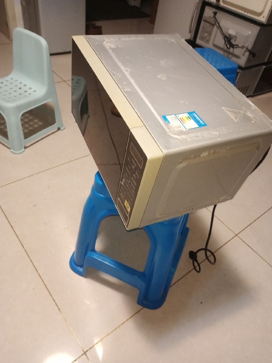 美的微波炉,表面保护膜还没撕下来,加热快,...