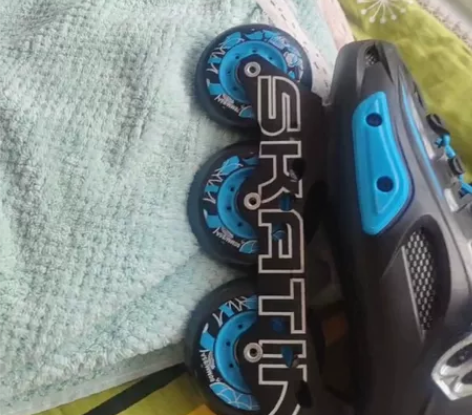 斯凯汀正品轮滑鞋，孩子的姑姑在郑州商场10...