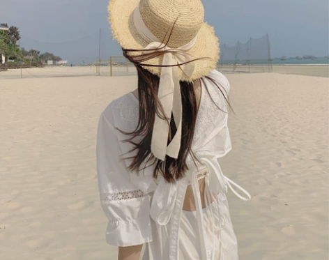 韩版海边优雅日系蝴蝶结平顶拉菲草草帽女夏季...