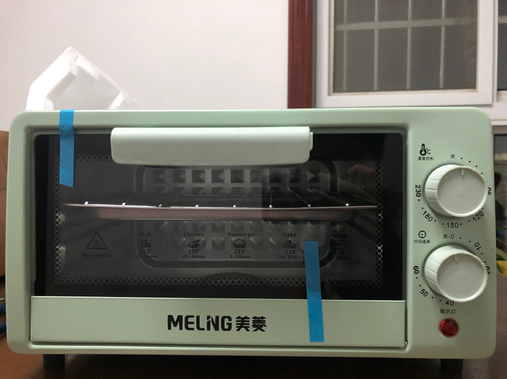 全新美菱烤箱升级款有烤网和烤盘