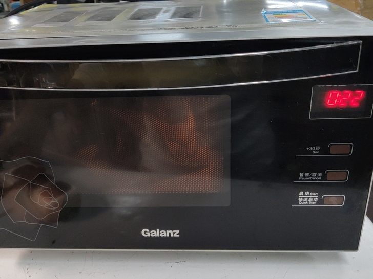 格兰仕微波炉，外观成色看图片。功能正常没有...