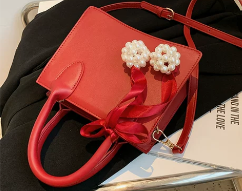 高级感包包网红色新娘结婚女包2022新款时...