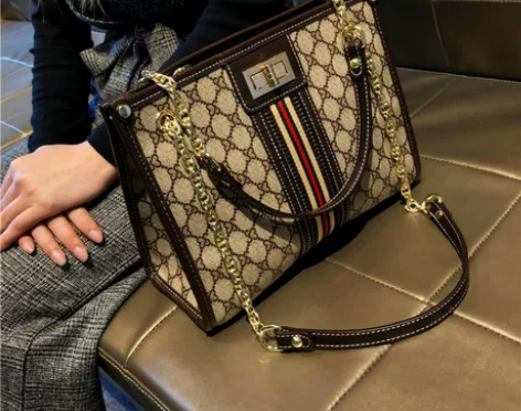 香港品牌包包女2022新款潮真皮洋气单肩托...