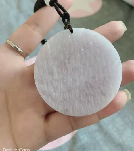 紫色翡翠原石，透手的哦，绳子还没有打开过，...