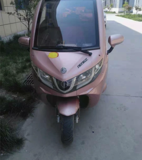 因城市限行低价出售能众封闭式电动车，去年1...
