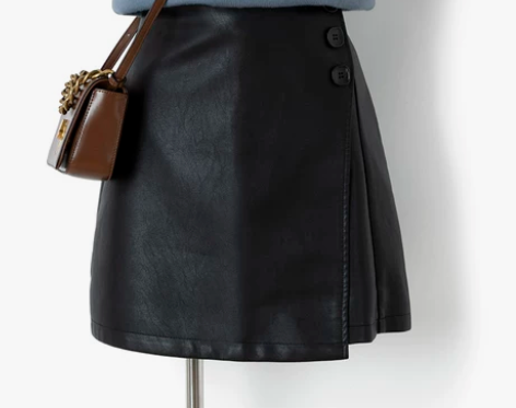 ins港风不规则黑色小皮裙百搭排扣开叉不对...