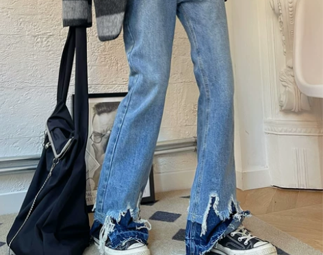 牛仔裤女裤脚拼色磨破撕边韩国chic高腰显...