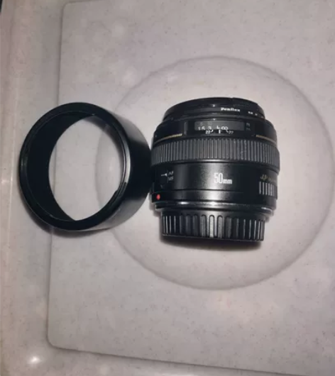 自用佳能FE50一1.4镜头9新,外壳旡划...