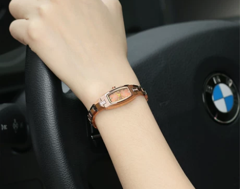 正品超薄防水手表女士腕表石英女钨钢女表男情...