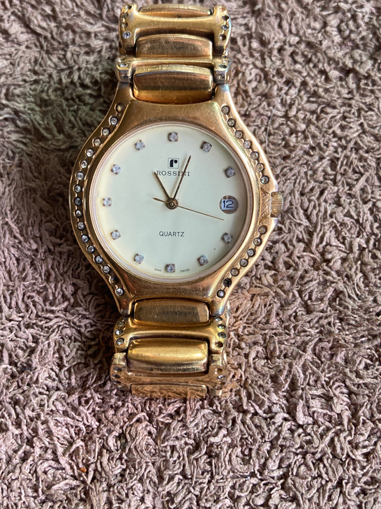 罗西尼古董石英手表，正常走时，日历功能正常...