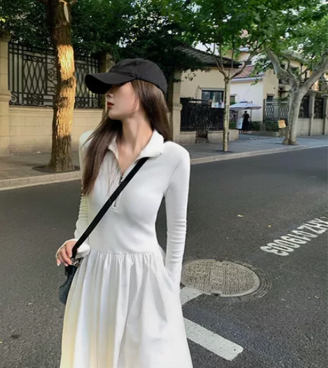 黑白色修身长袖针织连衣裙女秋季新款中长款大...