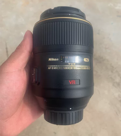 尼康105VR微距成色新,镜头上面有一点点...
