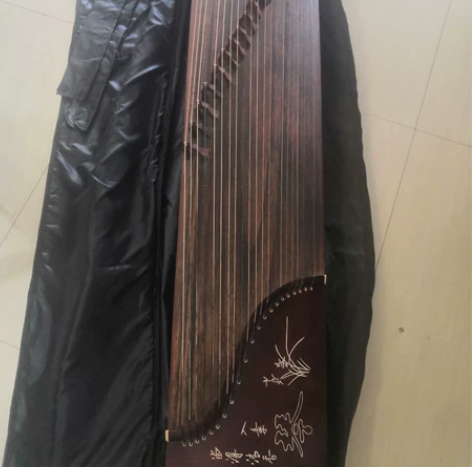 家里闲置一台古筝，送包和支架。 感兴趣的话...